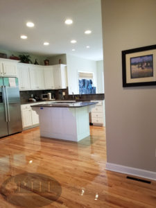 Red oak kitchen floors refinished with three coats oil base.