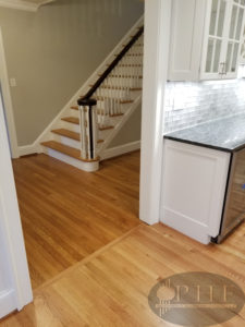 Refinished oak floors with one coat golden pecan stain and three coats oil base satin.