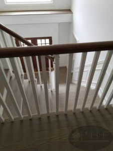 Custom made stain using a mix of country white and ebony stain and four coats water base satin.