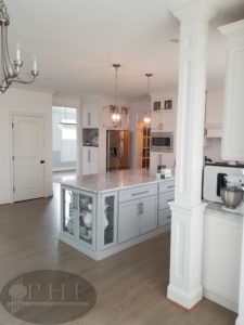 Custom made stain using a mix of country white and ebony stain and four coats water base satin.