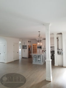 Custom made stain using a mix of country white and ebony stain and four coats water base satin.